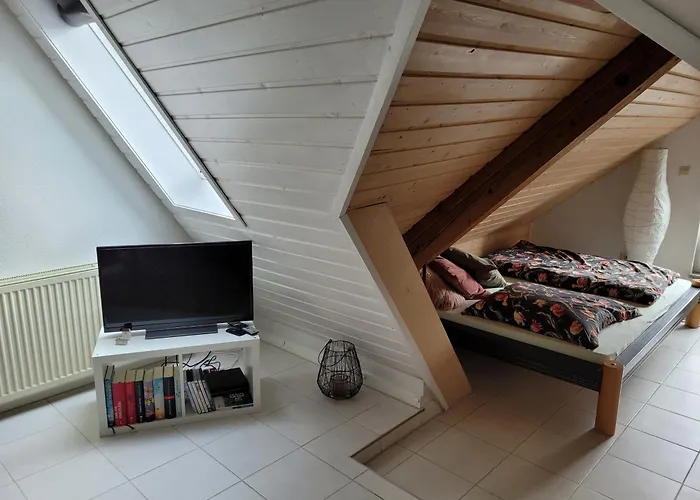 Апартаменты Zentrale Dachwohnung In Sha *